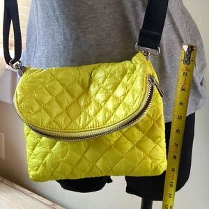 Neon purse--never used. Size is about 7 1/2" h, 9 1/4" w. Fully extended 12"